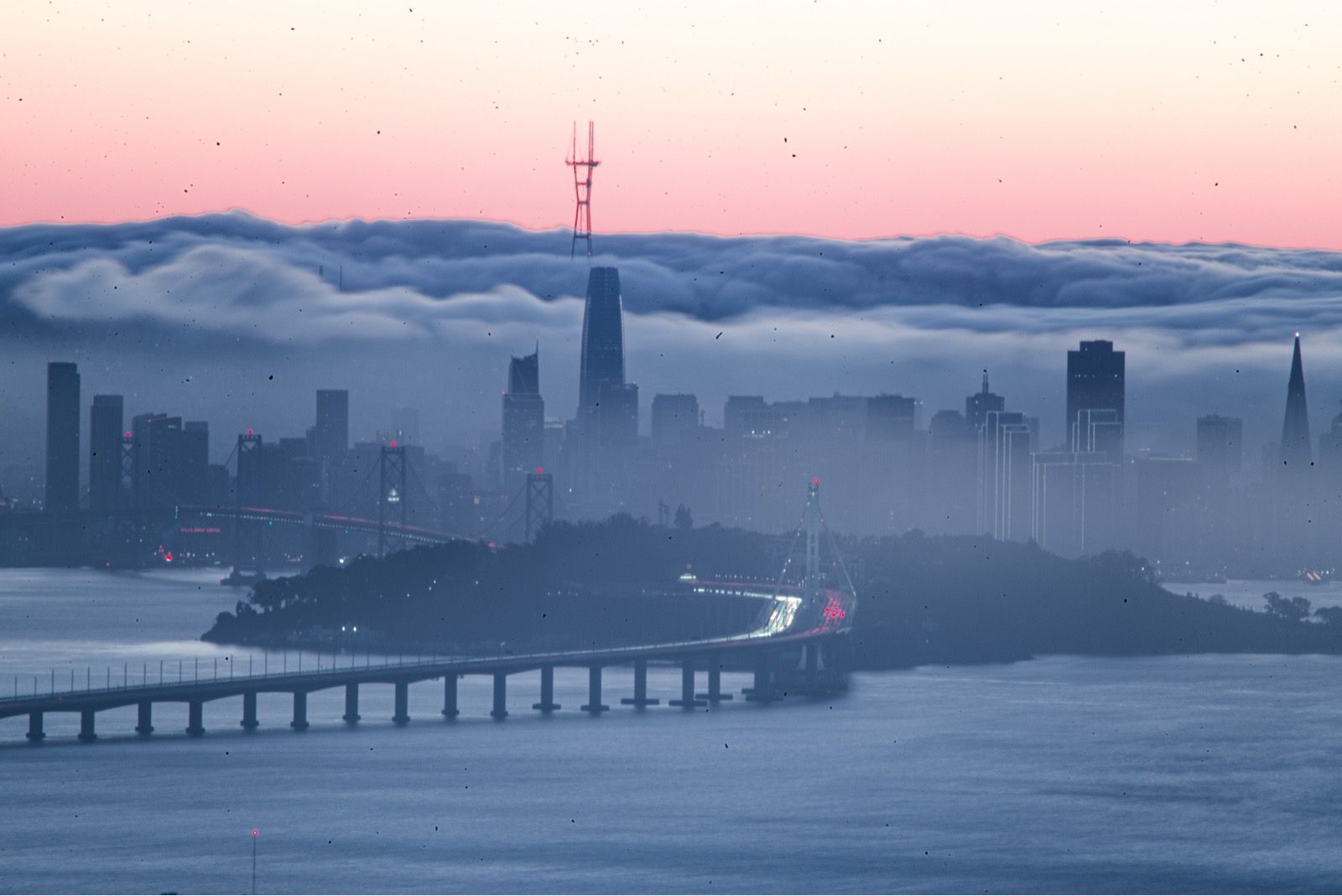 SF skyline at dusk, from a silent Bay ride